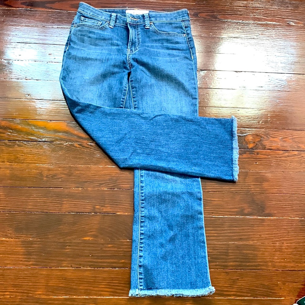 Velvet by Graham & Spencer designer jeans. Size 25. Frayed and wide bottoms.